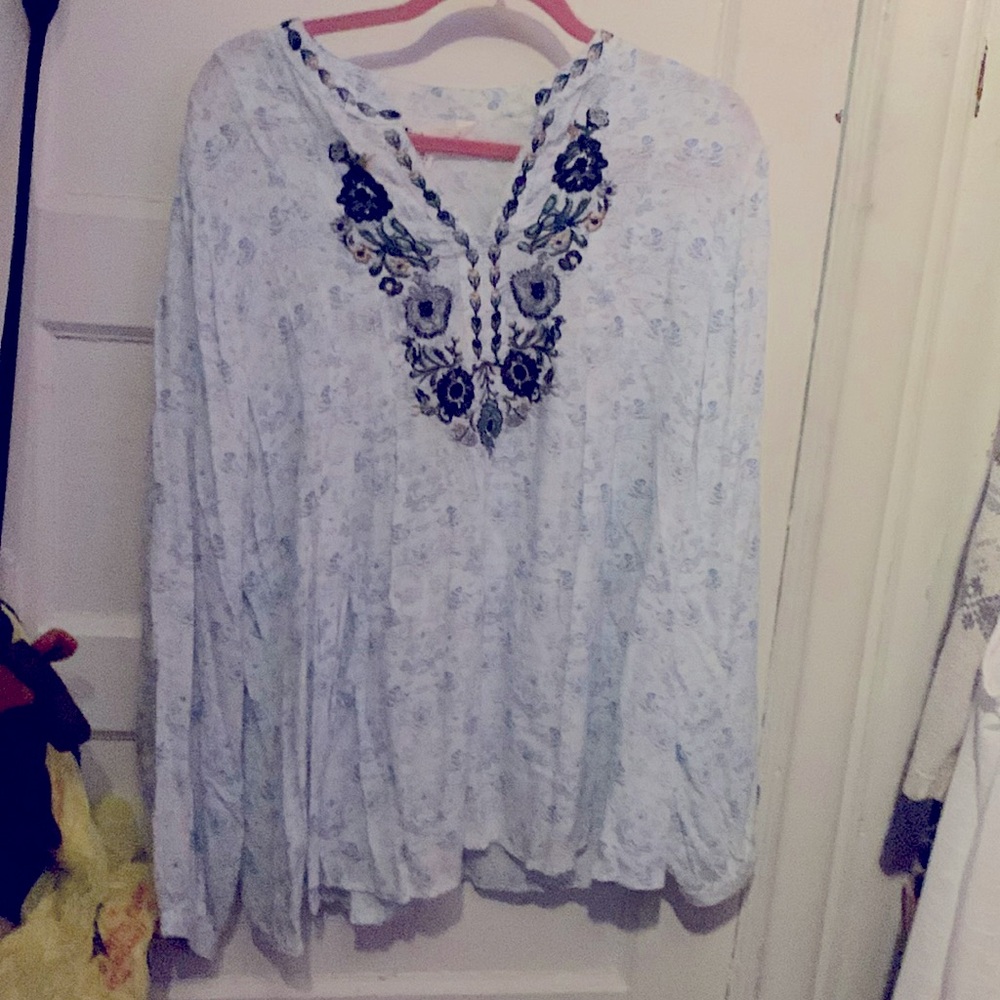 New blouse extra button attached